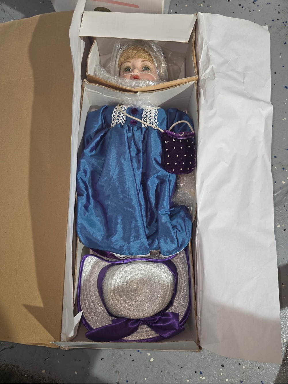Porcelain Doll in Blue Satin Dress with Purple Accessories